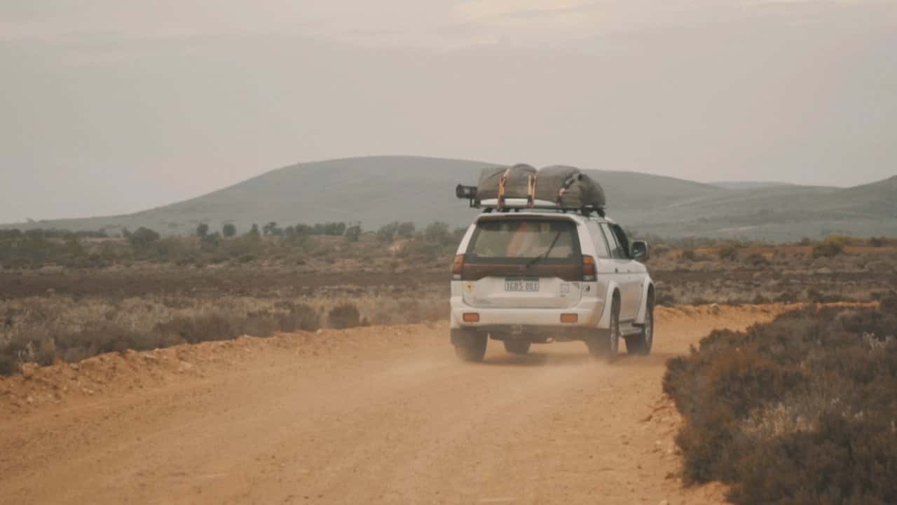Facing Down Under: A Backpackers Documentary backdrop
